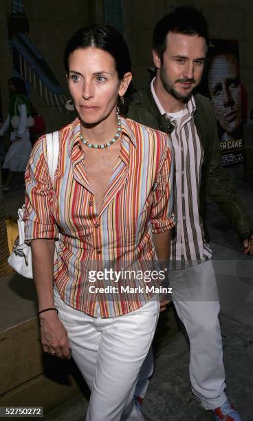 Actors Courteney Cox-Arquette and husband David Arquette attend the "Premiere of Sony Classics Layer Cake" at the Egyptian Theatre on May 2, 2005 in...