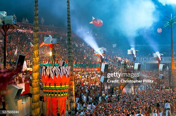 Brazil -Parintins - The Boi Bumba carnival and a group of participants with heavily feathered costumes give an infectious rhythm to the celebrations...