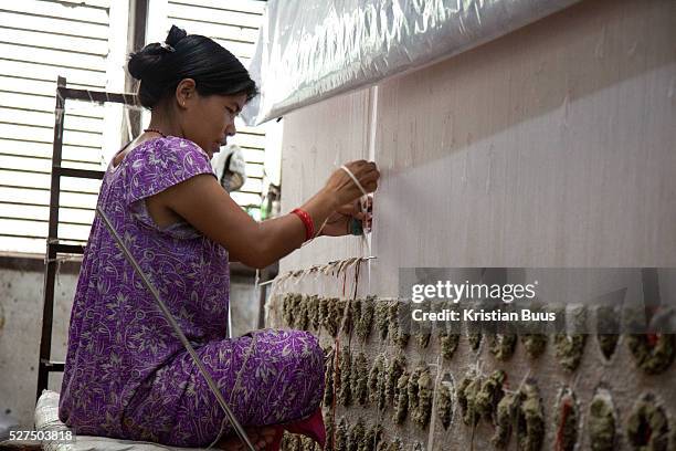 Weavers at Amity Carpent Factory. Amity Factory does not employ children and is a licensee of the GoodWeave Foundation and their carpets carry the...