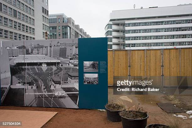 An outdoor exhibition panel near the former Checkpoint Charlie, the former border between Communist East and West Berlin during the Cold War. The...