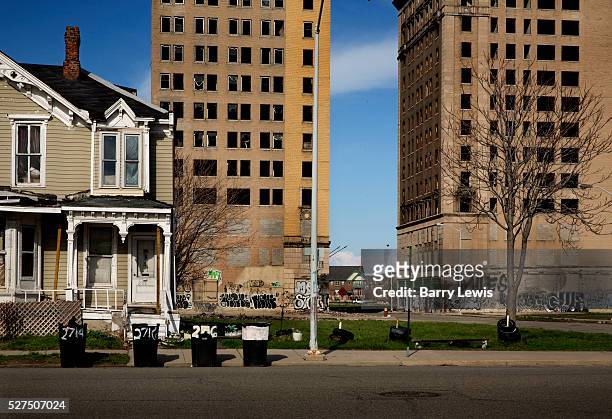 Empty apartment blocks Woodward Avenue, Detroit. Known as the world's traditional automotive center, "Detroit" is a metonym for the American...
