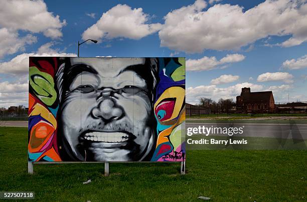 Painting in the Grand River Creative Corridor in Detroit, where artists have been invited to claim large canvases, and the streetscape is very...