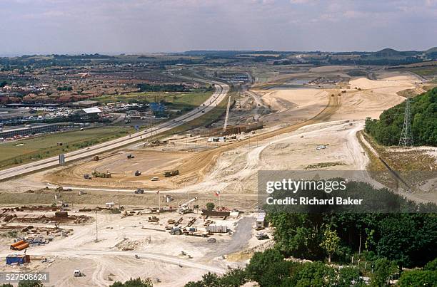 From Cheriton Hill, we see the new Channel Tunnel rail terminal under construction in the Kent countryside at Cheriton, Folkestone in 1989. The...