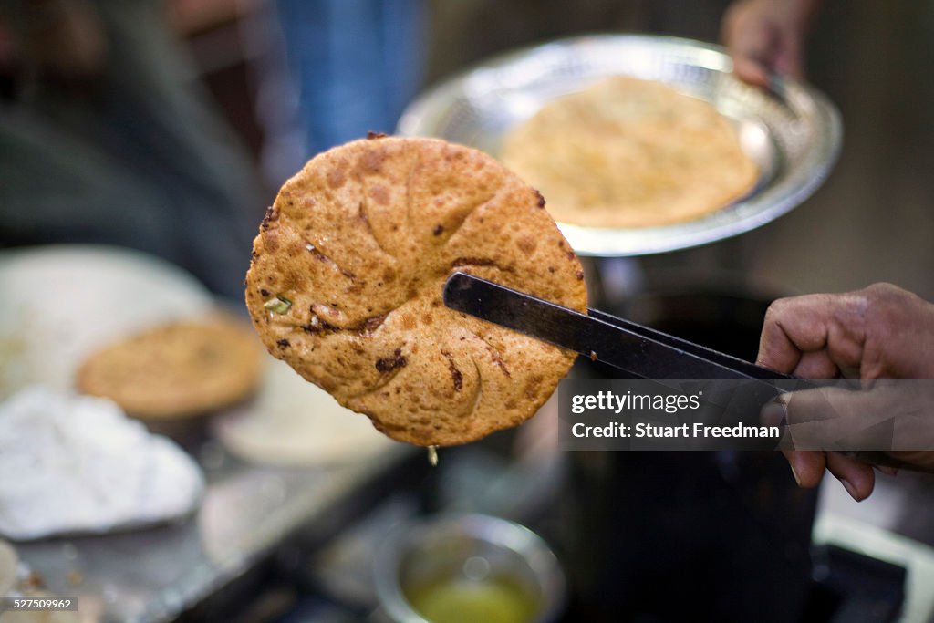 India - Delhi - A fried paratha at the famous Parawthe Walla in Old Delhi