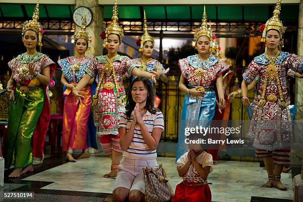 Worshipers in the Erawan Shrine, Bangkok. It is Brahman, not strictly Buddhist. And yet, this famous shrine attracts more visitors than many of the...