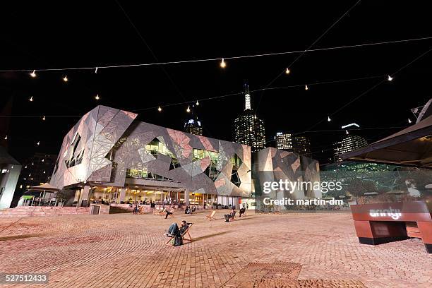 outdoor cinema in melbourne - federation square melbourne stock pictures, royalty-free photos & images