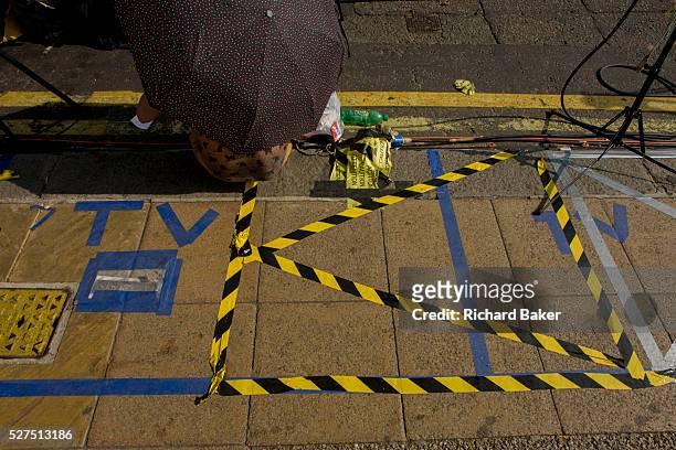 Foreign media tape markings for their TV broadcasts outside St Mary's Hospital, Paddington London, where media and royalists await news of Kate,...