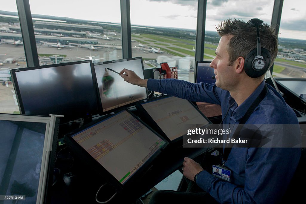 Heathrow air traffic controller in control tower at Heathrow