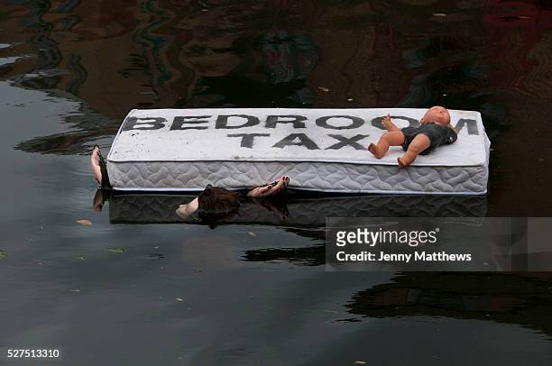 London, Hackney, July 28th 2013. Regent's Canal. How much money could we, the users of the welfare state, save the UK if we all killed ourselves?An...