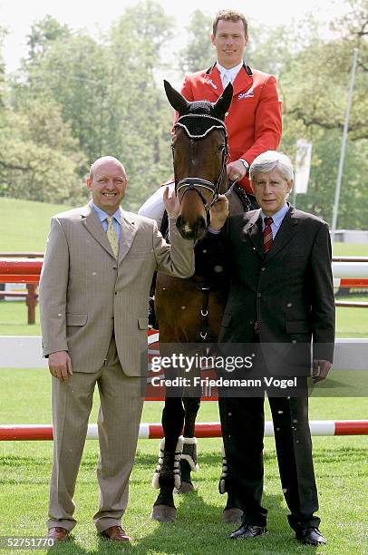 Volker Wulff, Christian Ahlmann, Paul Schockemoehle poses after the press conference of the German Jumping and Dressage Grand Prix on May 3, 2005 in...