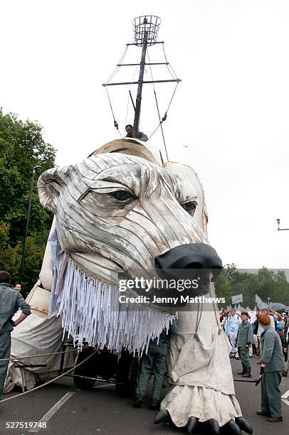 Aurora, the double-decker-bus-size polar bear puppet specially commissioned by Greenpeace to lead an Arctic-inspired street parade to the London HQ...