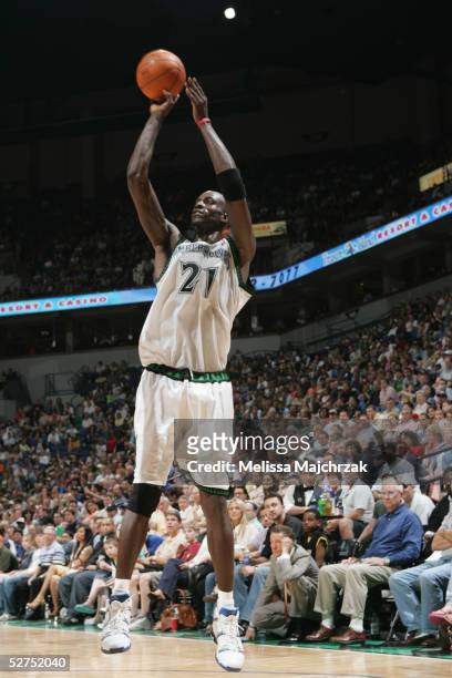 Kevin Garnett of the Minnesota Timberwolves shoots against the Seattle Sonics during the game at Target Center on April 17, 2005 in Minneapolis,...