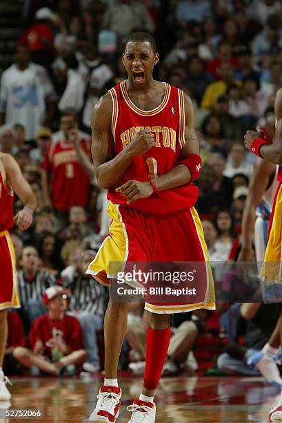 Tracy McGrady of the Houston Rockets celebrates during the game against the Denver Nuggets on April 16, 2005 at the Toyota Center in Houston, Texas....