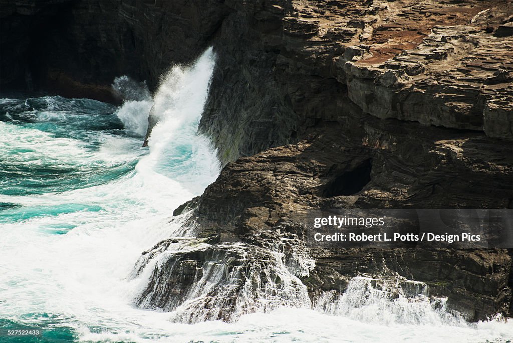 Surf Breaks On The Rocks High-Res Stock Photo - Getty Images