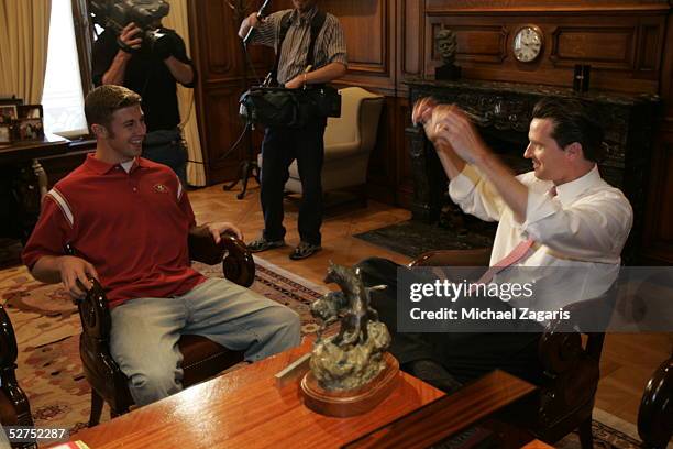 Quarterback Alex Smith meets with San Francisco Mayor Gavin Newsom at City Hall April 25, 2005 in San Francisco, California. Smith was drafted first...