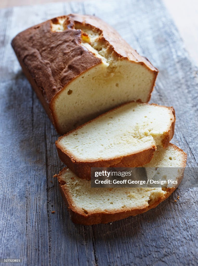 Pound cake sitting on a barnboard