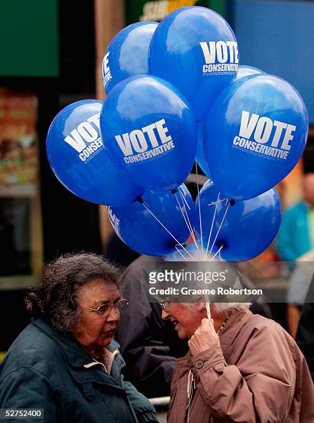 Elderly supporters come to see Conservative Party Leader Michael Howard as he heads out into the streets for the last two days of campaigning on May...