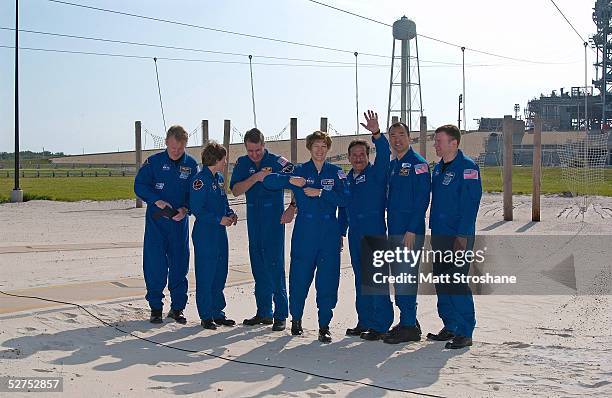 Space Shuttle Discovery mission specialists Andrew Thomas, Wendy Lawrence, Stephen Robinson, commander Eileen Collins, mission specialists Charles...