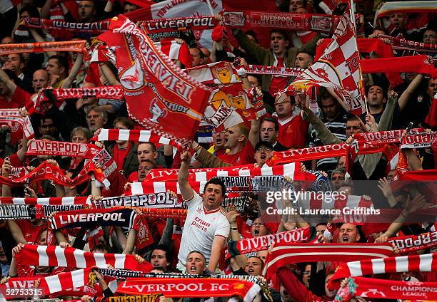 Liverpool fans wave flags and scarves in the Kop before the UEFA Champions League semi-final second leg match between Liverpool and Chelsea at...