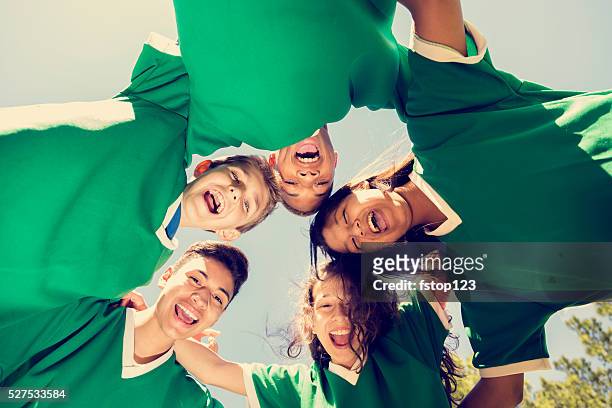 sports: teenage friends soccer team with sky, park background. - five friends unity stock pictures, royalty-free photos & images