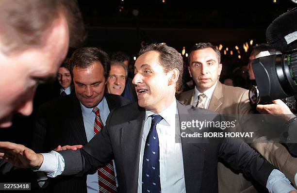 Nicolas Sarkozy , head of the French UMP party, arrives to attend a meeting with Renaud Muselier , French Foreign Affairs junior minister, to support...