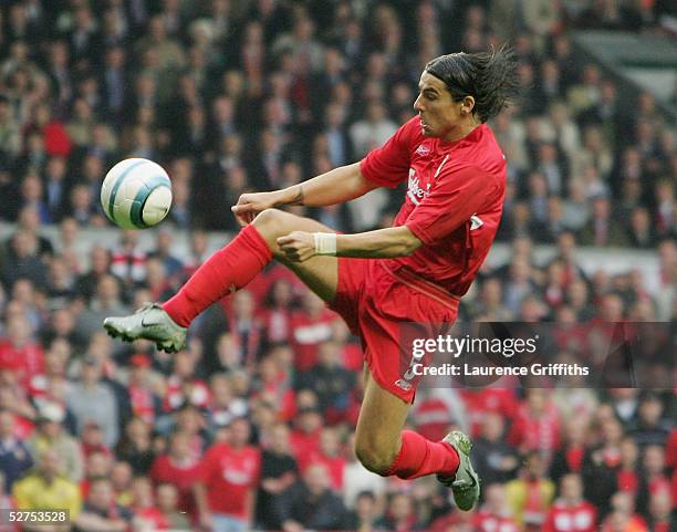 Milan Baros of Liverpool controls the ball and has his shot blocked on the line before Luis Garcia scores the opening goal during the UEFA Champions...