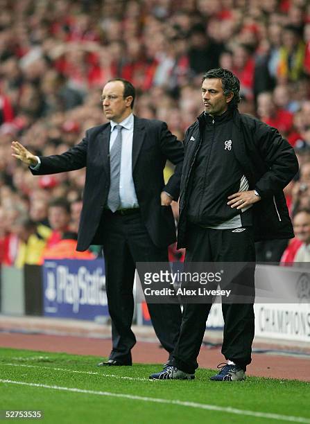 Jose Mourinho, the Chelsea manager looks on as Rafael Benitez gives instructions during the UEFA Champions League semi-final second leg match between...