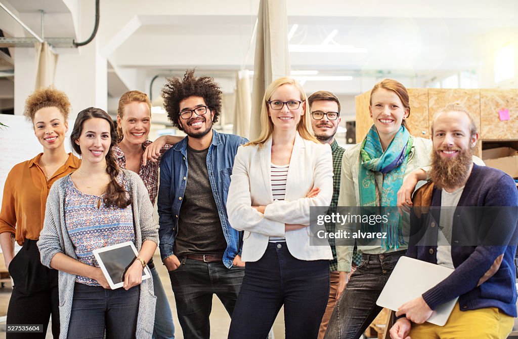 Confident business team smiling in office