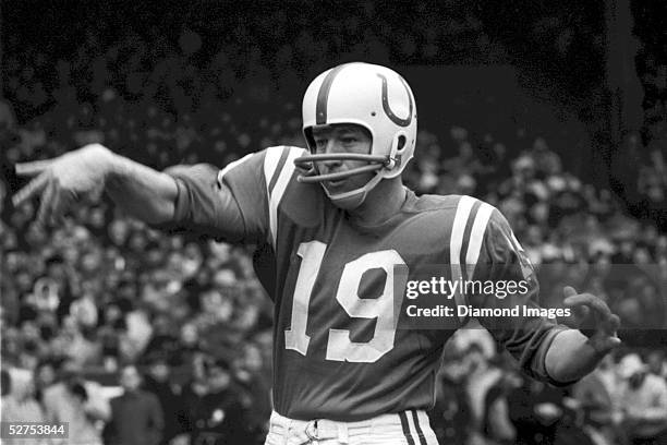Quarterback Johnny Unitas of the Baltimore Colts, warms up prior to the NFL Championship Game on December 27, 1964 against the Cleveland Browns at...