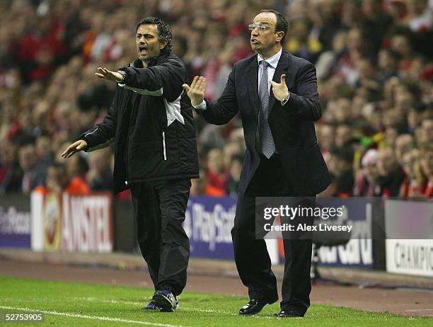 Jose Mourinho the manager of Chelsea and Rafael Benitez the manager of Liverpool shout instructions to their players during the Champions League semi...