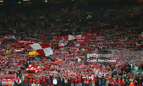 Liverpool fans in the Kop celebrate after their team defeated Chelsea in the Champions League semi final second leg match between Liverpool and...