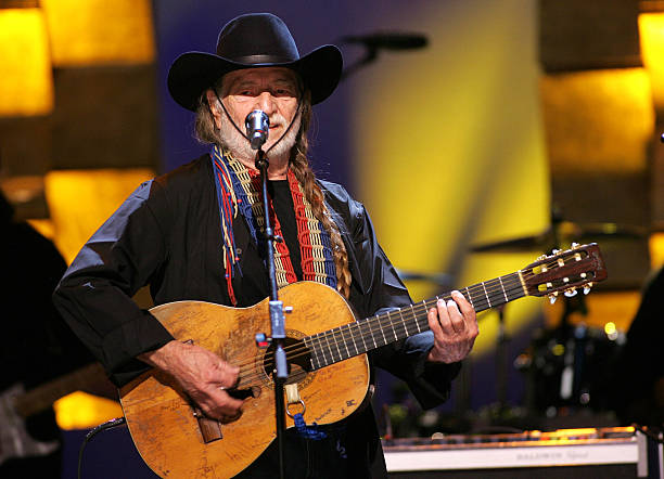 Singer Willie Nelson performs onstage at the MTV Networks Upfront at the Paramount Theater May 3, 2005 In New York City.
