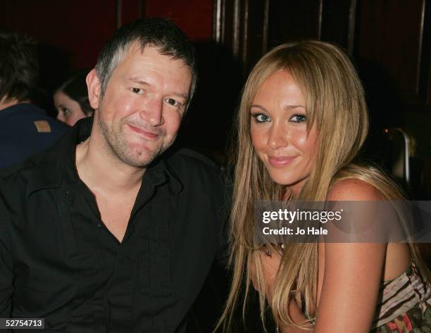 Pop singer Jenny Frost and partner Dominic Thrupp attend "An Evening With Patrizio Buanne" at 5 Cavendish Square on May 3, 2005 in London.