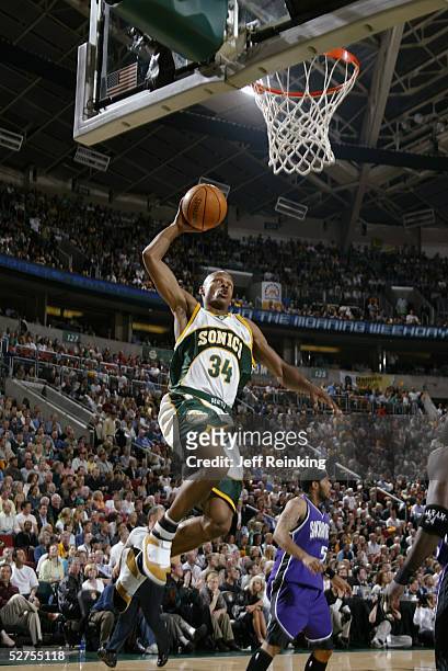 Ray Allen of the Seattle SuperSonics dunks against the Sacramento Kings in Game five of the Western Conference Quarterfinals during the 2005 NBA...
