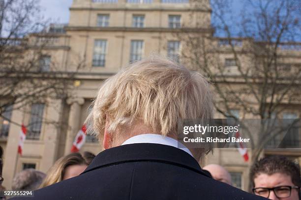 We see the famous blonde hair of London Mayor Boris Johnson as he is interviewed in Trafalgar Square. Alexander Boris de Pfeffel Johnson is a British...