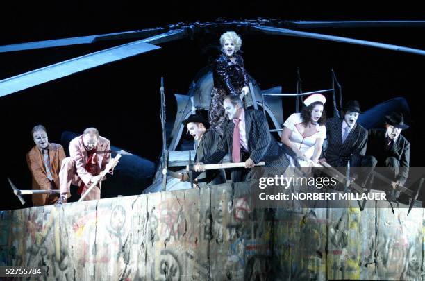 Actors of the Saxony State Opera rehearse a scene of the opera "The Rise and Fall of the City of Mahagonny" by dramatist Bertolt Brecht and composer...