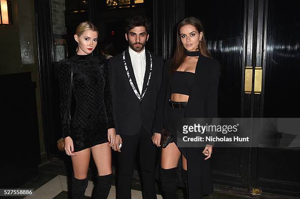 Model Maddie White, Stephen Orso and model Talia Richman attend the Balmain and Olivier Rousteing after the Met Gala Celebration on May 02, 2016 in...