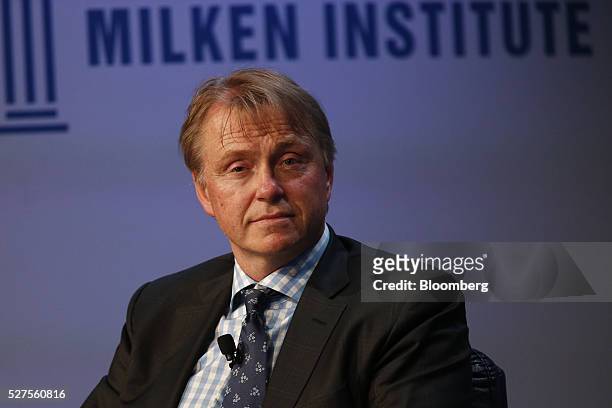 Wesley Edens, founder and co-chairman of Fortress Investment Group LLC and co-owner of Milwaukee Bucks, listens during the annual Milken Institute...