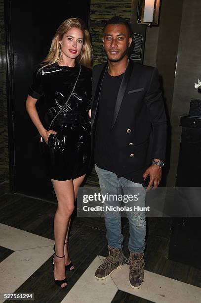 Model Doutzen Kroes and DJ Sunnery James attends the Balmain and Olivier Rousteing after the Met Gala Celebration on May 02, 2016 in New York, New...