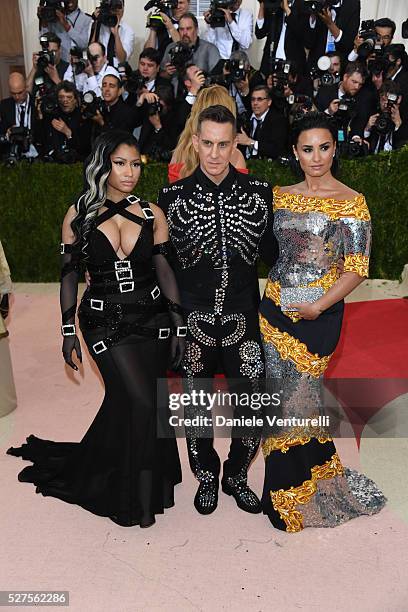 Fashion designer Jeremy Scott, rapper Nicki Minaj and Demi Lovato attend the 'Manus x Machina: Fashion In An Age Of Technology' Costume Institute...