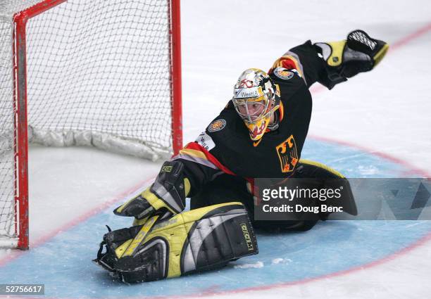 Goaltender Robert Muller of Germany makes a save against the Czech Republic in the IIHF World Men's Championships preliminary round group D game at...