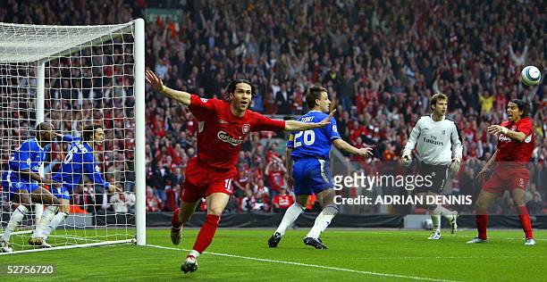 United Kingdom: Sequence 7 of 7 - Liverpool's Luis Garcia celebrates scoring a goal as Chelsea's William Gallas tried to clear the ball alongside...