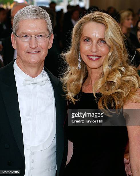 Apple CEO Tim Cook and Laurene Powell-Jobs, widow of Steve Jobs, attend "Manus x Machina: Fashion in an Age of Technology", the 2016 Costume...