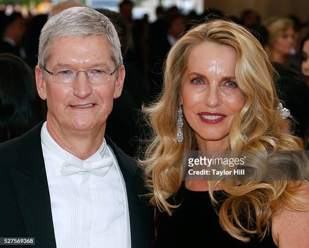 Apple CEO Tim Cook and Laurene Powell-Jobs, widow of Steve Jobs, attend "Manus x Machina: Fashion in an Age of Technology", the 2016 Costume...