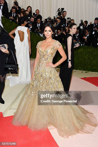 Nina Dobrev attends the 'Manus x Machina: Fashion in an Age of Technology' Costume Institute Gala at the Metropolitan Museum of Art on May 2, 2016 in...