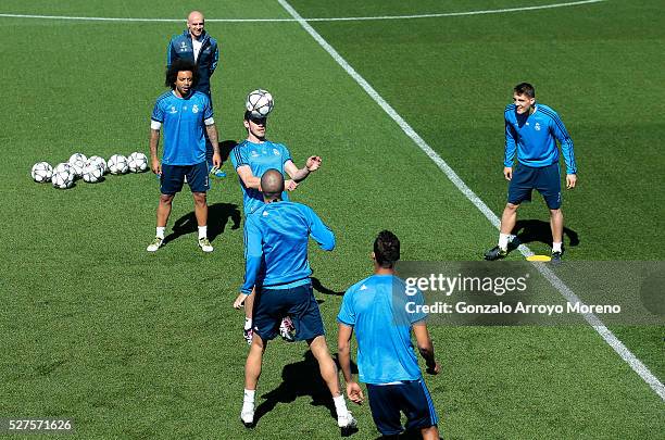 Gareth Bale of Real Madrid controls the ball during a training session ahead of the UEFA Champions League Semi Final Second Leg between Real Madrid...