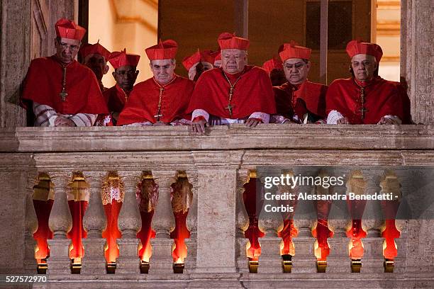 Cardinals stand on the balcony of St. Peter's Basilica during the first appereance of Newly elected Pope Francis I on the central balcony of St...