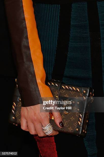 Miranda Kerr, clutch detail, ring detail, attends "Manus x Machina: Fashion in an Age of Technology", the 2016 Costume Institute Gala at the...