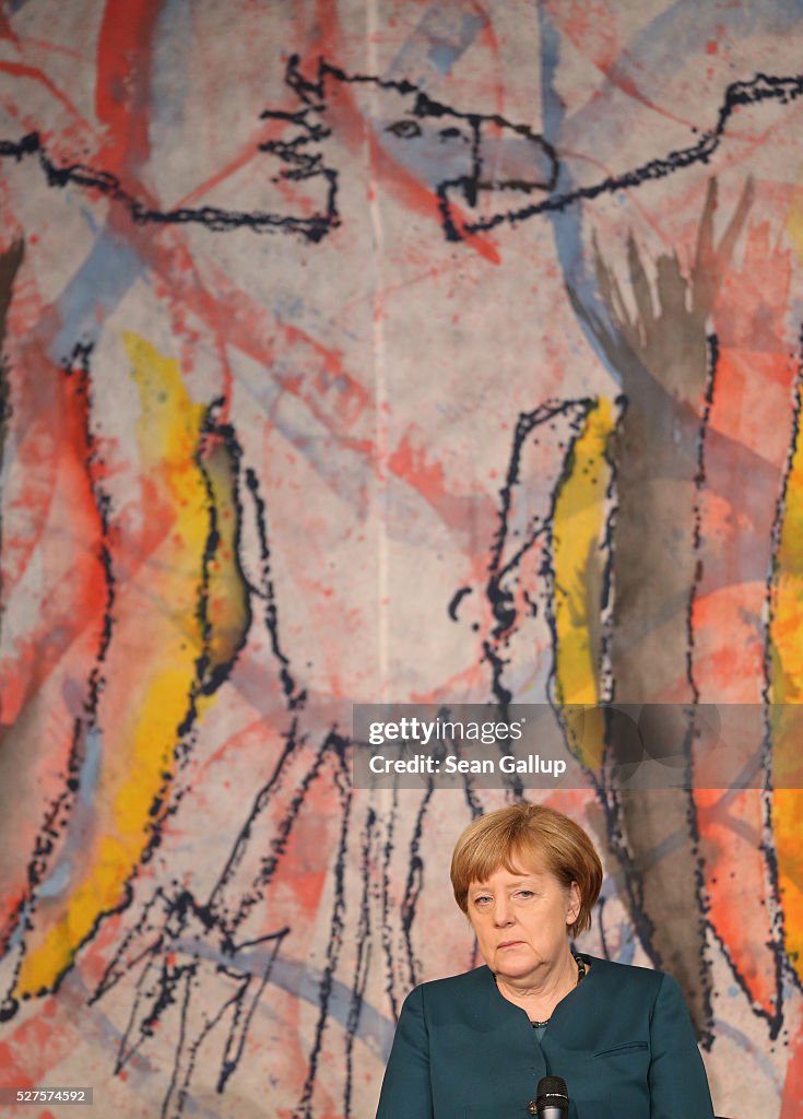 Merkel Visits French Lycee To Discuss EU Issues