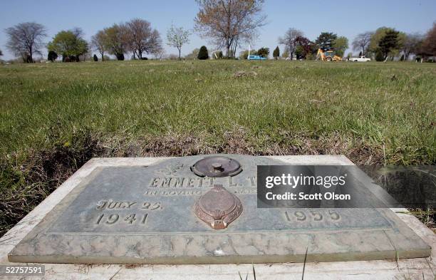 Plaque marks the gravesite of Emmett Till at Burr Oak Cemetery May 4, 2005 in Aslip, Illinois. The FBI is considering exhuming the body of Till,...